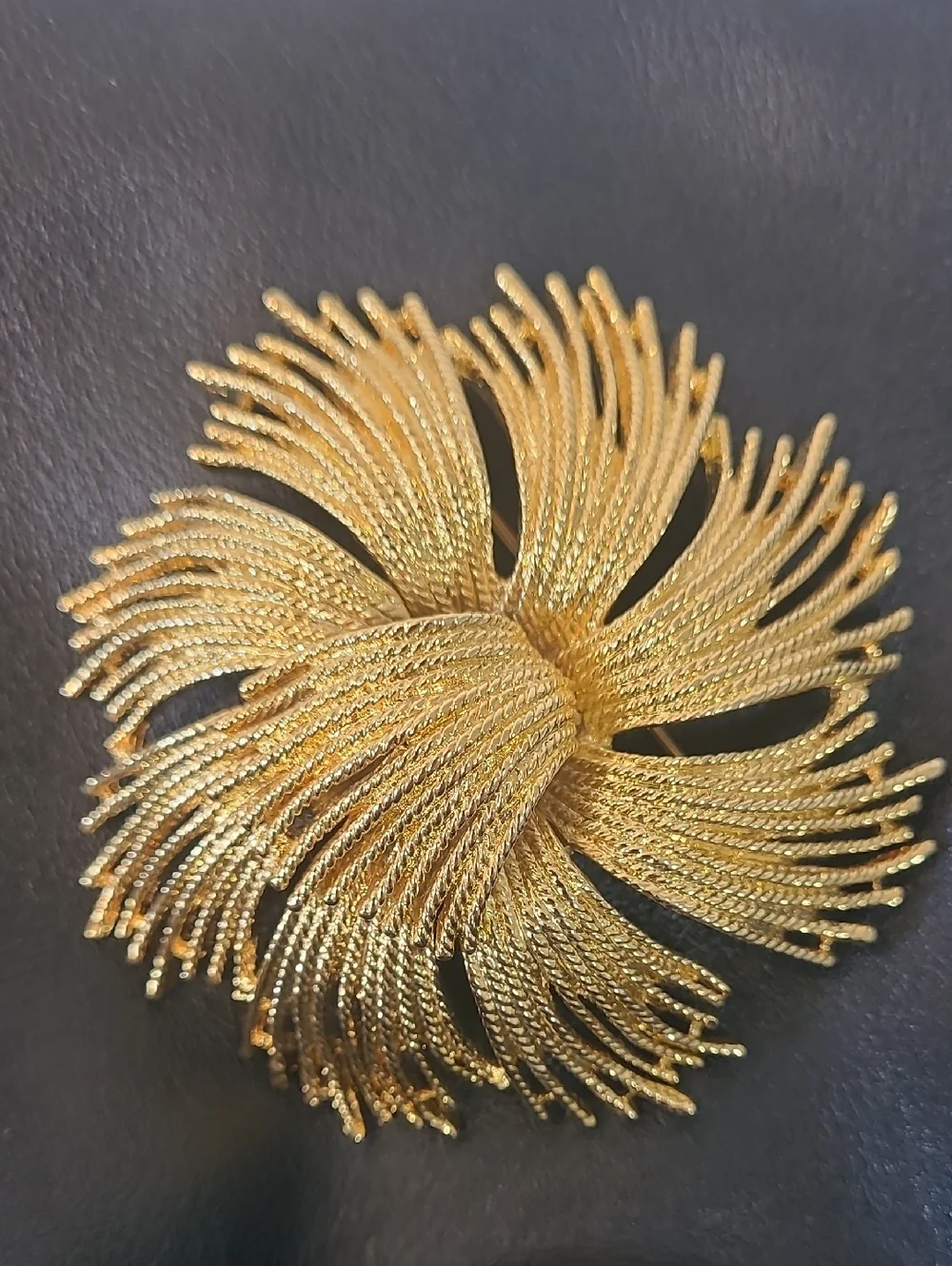 Monet Vintage Cordelia Gold Tone Starburst Brooch with Textured Metal Threads
